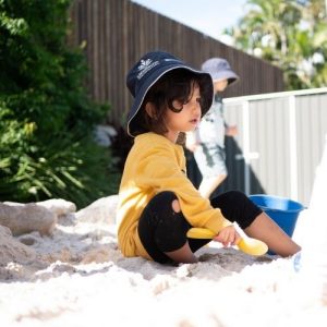 Kid Playing in the Sand - Underwood Early Learning Centre