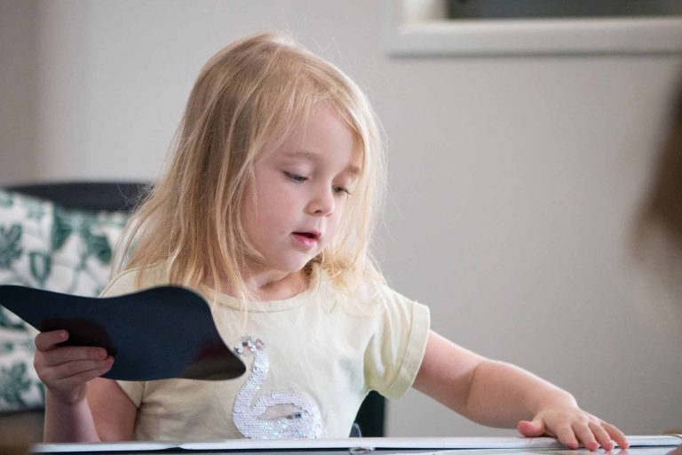 solo-play-blog Little girl at the table doing some activity - Benefits of Solo Play - Your ELC
