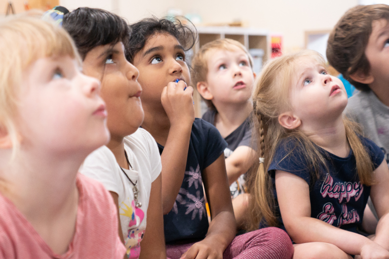 Happy children Children listening at the centre - Your ELC