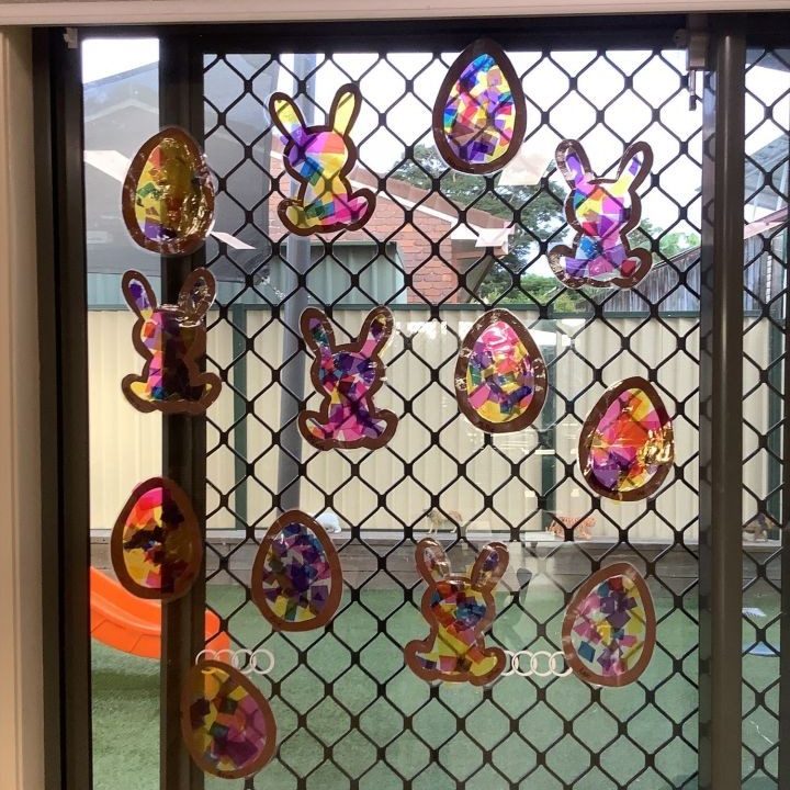 Easter bunny and eggs decors on glass window - Cleveland April 2022 newsletter image