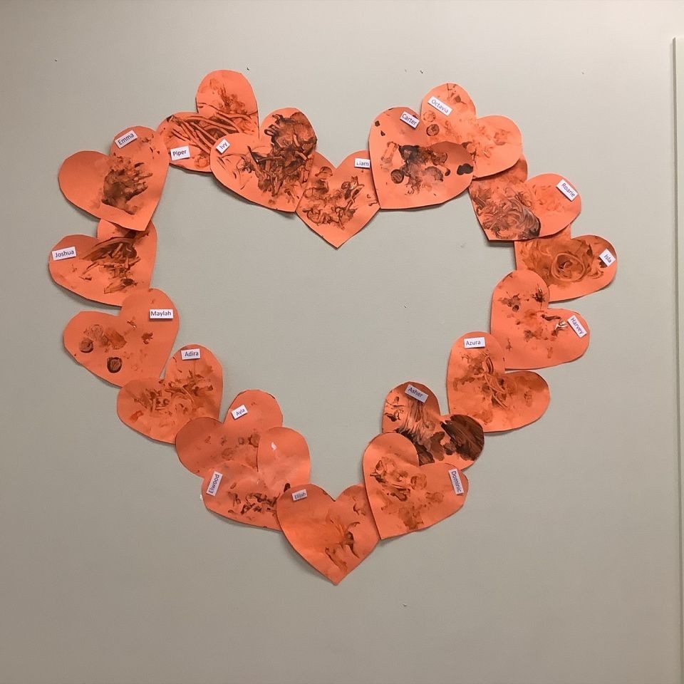 Heart postcards forming a heart on a wall - Cleveland April 2022 Newsletter image