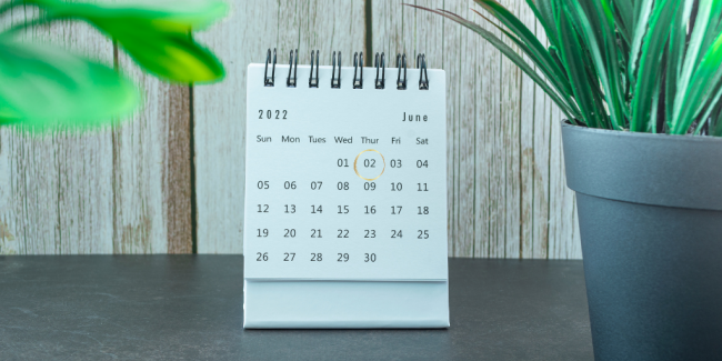 UND Class Photo 22 A June 2022 calendar with plants on the side - Your ELC image