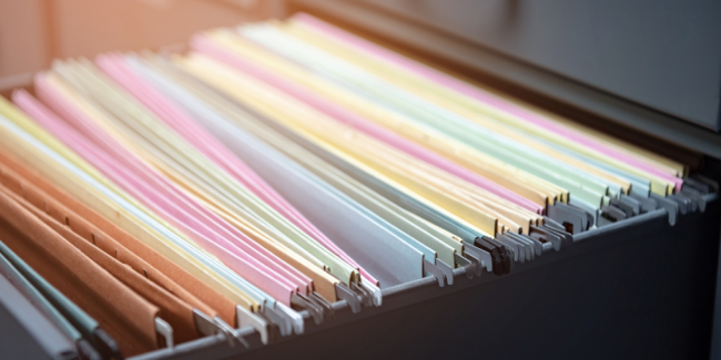 UND Policies blog A filing cabinet with different colours - Your ELC image
