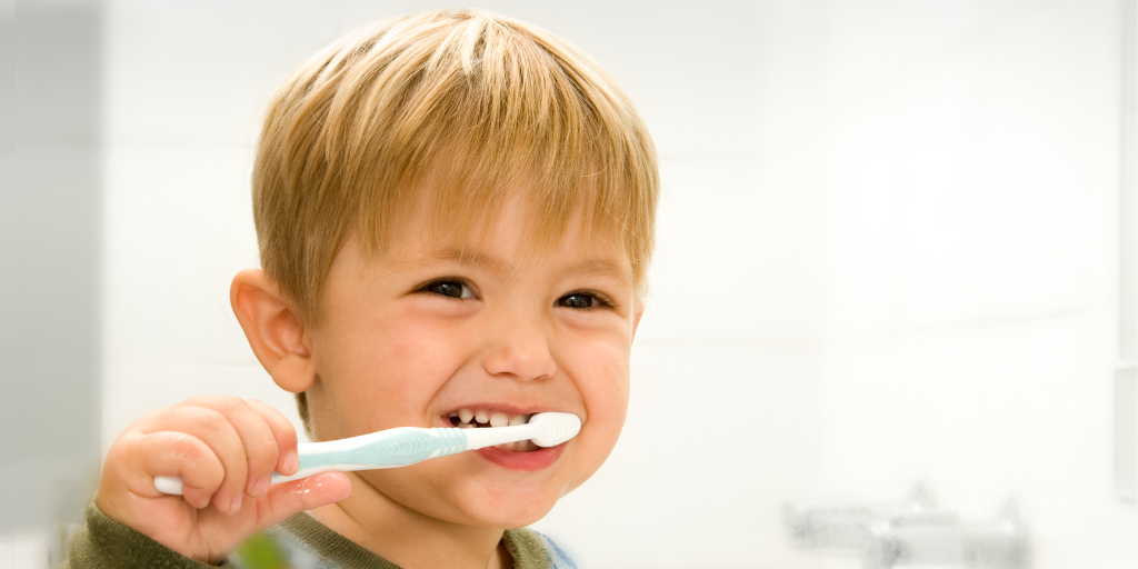 Dental Van Visit A kid brushing his teeth - Your ELC