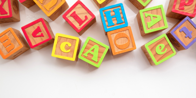 Communication Development Tips Letter blocks scattered - Your ELC