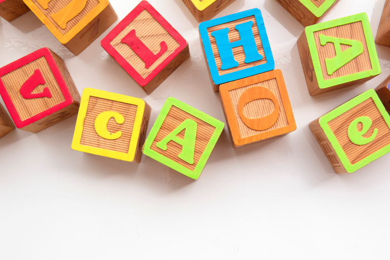 Communication Development Tips Letter blocks scattered - Your ELC