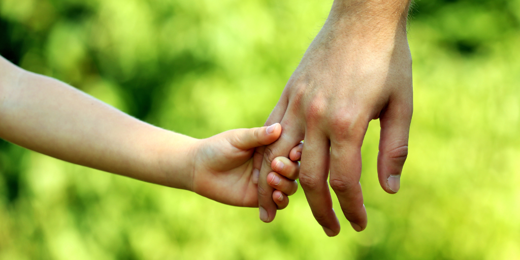 Room Transitions Child holding and adult's hand | Your ELC blog image