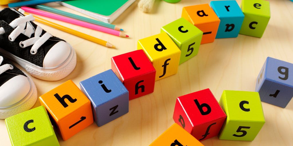 What To Know Before Your Child Starts Childcare Playing blocks with letters | Your ELC blog image