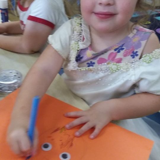 A child making an artwork | Your ELC blog image