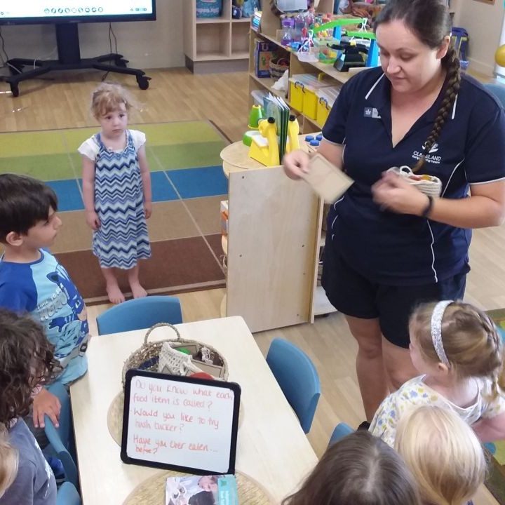 A teacher and children doing an activity | Your ELC blog image