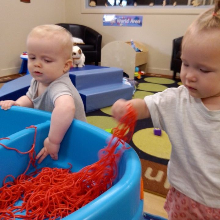 Children playing red strings | Your ELC blog image
