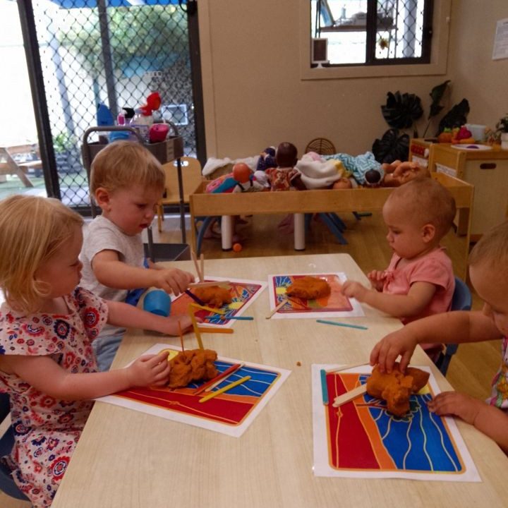 4 children playing clay | Your ELC blog image
