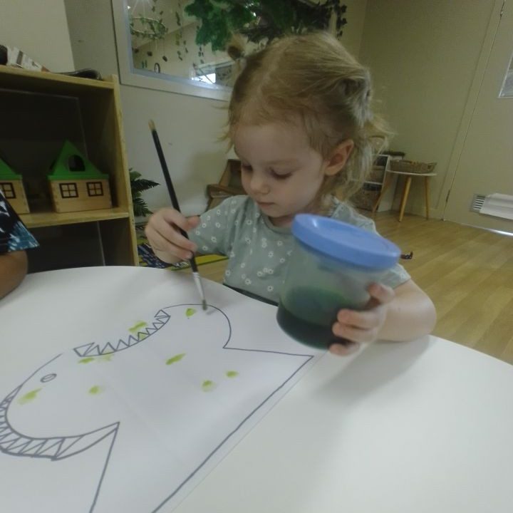 Child painting using water color | Your ELC blog image