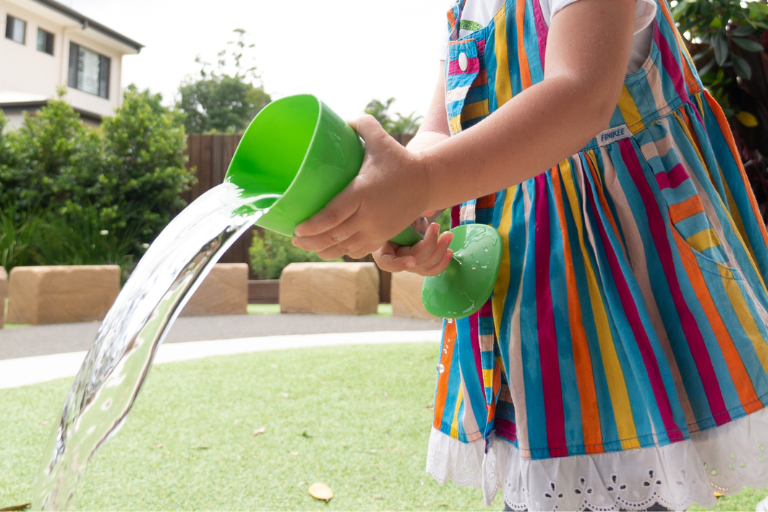 Water Play Blog Child playing with water | Your ELC blog image